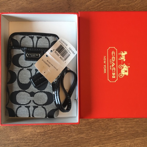 Coach Handbags - NWT Coach logo wristlet in box